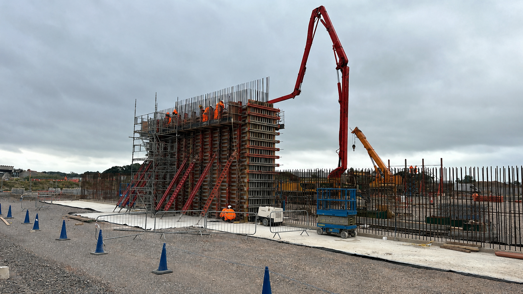Abutment wall pour with concrete pump boom