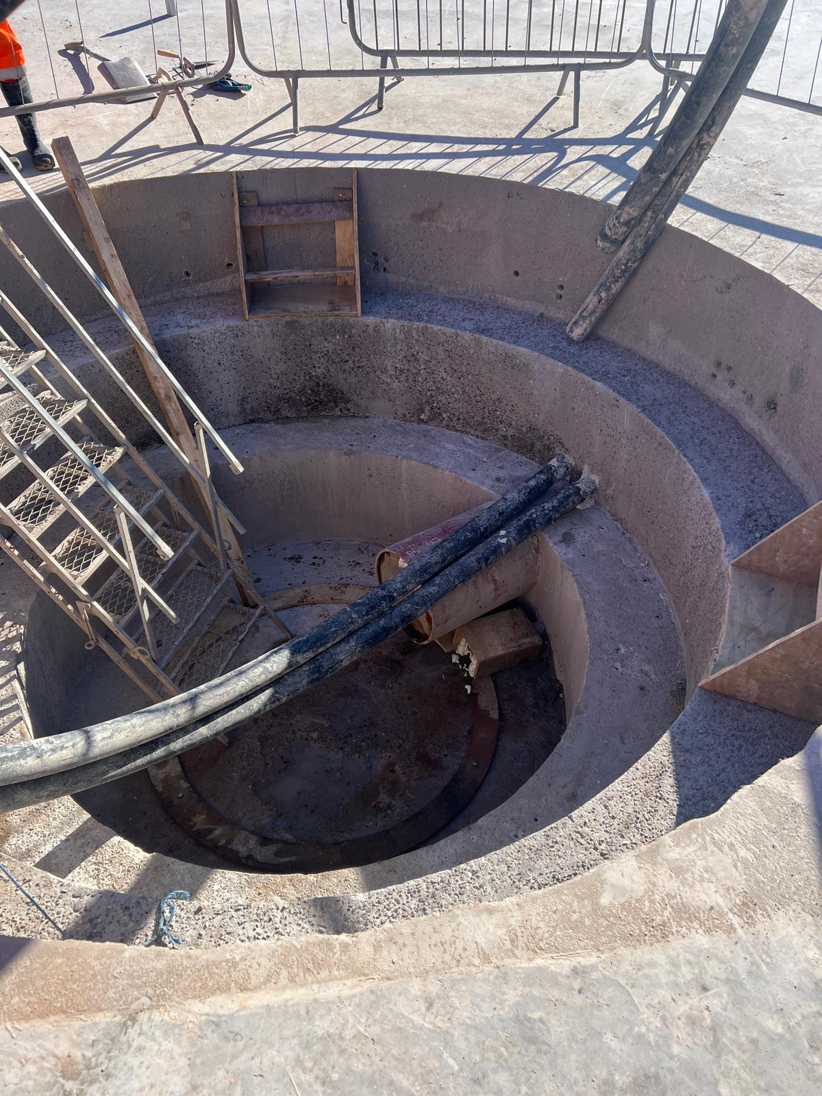 Completed concrete hopper interior — stepped profile